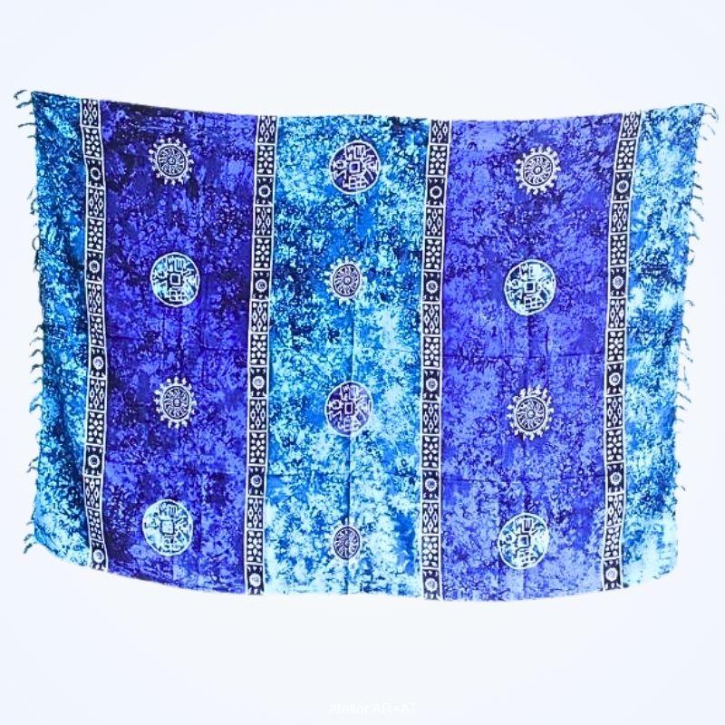 Batikovaný sarong se symboly mincí